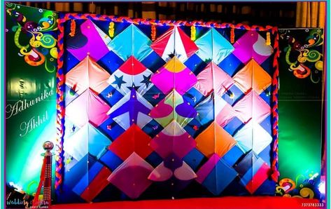 Colourful kites background for photobooth.... #indianweddingblog #saree #designerblouse #teluguwedding #telugubride #tamilwedding #tamilbride #weddingbrigade #gorgeousbride #shopzters #shaadimagic #bridesessentials #ezwed #pellipoolajada #southindianbride #southindianwedding #templejewellery #southindianweddingdecor Kite Wall Decor, Kite Decor, Mehandi Decoration, Kite Photo, Photo Wall Design, Kite Decoration, Kite Store, Cake Photoshoot, Mehendi Decor Ideas