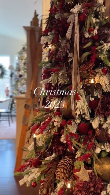 Louisa on Instagram: "Christmas 2023✨ Snowy flocked branches covered in dark red, burgundy, brown and bronze tones for my family room tree. I’m just waiting on some cluster twinkle lights to arrive, then it will be done. I hope you all have a wonderful week and a Happy Thanksgiving 🦃 . . #christmastrees #christmasdecorations #christmasmood #christmasvibes #christmascountdown #christmasornaments #vintagechristmas #cozyhome #howiholiday #holidayhome #nostalgicchristmas #cottagecore #cottagestyle" Brown Burgundy Christmas Tree, Red Christmas Tree Flocked, Brown And Burgundy Christmas Tree, Red And Brown Christmas Decor, Burgundy And Brown Christmas Tree, Brown And Red Christmas Decor, Red And Burgundy Christmas Tree, Brown And Red Christmas Tree, Red And Brown Christmas Tree