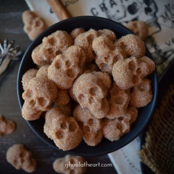 Cinnamon Sugar Skulls - Ghoul at Heart Skull Cast Iron Pan Recipes, Skull Pan Cake Recipes, Halloween Skull Recipes, Ghoul At Heart Recipes, Mini Skull Pan Recipes, Halloween Skull Food, Skeleton Mold Recipes, Skull Silicone Mold Recipes, Skull Cake Pan Ideas