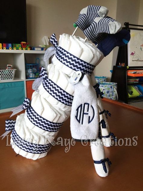 Surprise! 🐣 Exquisite Baby Shower Gifts For Boys Cute Diaper Gift Ideas, Vintage Golf Baby Shower Ideas, Golf Baby Shower Games, Golf Baby Shower Cake, Diaper Party Gift Ideas, Baby Boy Golf Shower Ideas, Masters Baby Shower Ideas, Baby Boy Nursery Golf Theme, Golf Themed Nursery Ideas