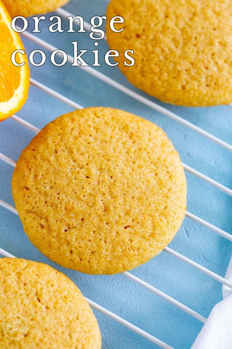 These Orange cookies have a soft melt-in-your-mouth texture and a delicious fresh orange flavor. These are simple butter biscuits with a fantastic zing to them. They are simple to make yet deliver amazing zesty flavors. These cookies have orange zest, fresh orange juice, and orange extract to ensure you get a great orange flavor. They make an excellent cookie for afternoon tea, and as there is no need to chill the cookie dough, you can eat the finished citrus cookie in 30 minutes! Cookies Sprinkles, Lemon Brownies, Orange Cookies, Sour Cream Recipes, Buttermilk Recipes, Chewy Brownies, Peanut Recipes, Double Chocolate Chip Cookies, Cookie Spread