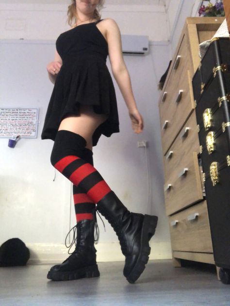 Red and black thigh high socks paired with black boots and a black tank top and skirt. Thigh High Socks With Dress, High Black Socks Outfit, Thigh High Socks Anime, Black Socks Outfit, Harajuku Style Black Thigh High Legwear, Red And Black Thigh High Socks, Thigh High Socks Outfit, Tank Top And Skirt, Black Thigh High Socks