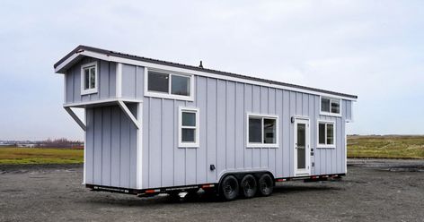 34-ft-long tiny house has room for a family – and even some friends too Tiny House Company, Burner Stove, Small Coffee Table, Some Friends, Wooden Beams, The Loft, Wall Mounted Tv, Mounted Tv, To Sleep