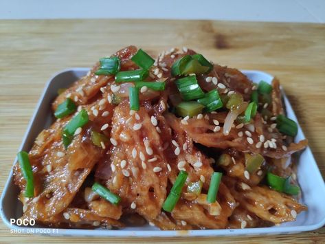 Crispy Lotus Stem is an Asian style stir-fry made with lotus stem or roots. This lotus stem stir-fry is definitely better than any Chinese takeout you are planning for dinner. Load it with your favorite vegetables/greens and you are all set for the crunchy stir-fry meal. Easy to make appetizer made with crispy fried lotus stem tossed in a spicy, sweet and tangy sauce. A perfect recipe for a quick snack which will leave your guests wanting for more. Hope you enjoy this . Lotus Stem Recipe, Easy To Make Appetizers, Chinese Takeout, Quick Snack, Stir Fry Recipes, Green Vegetables, Quick Snacks, Asian Style, Japchae