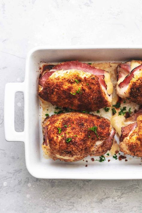 overhead view of four chicken bundles in a casserole dish Best Chicken Cordon Bleu Recipe, Dijon Cream Sauce, Ham Fried Rice, Ham And Bean, Cordon Bleu Recipe, Chicken Cordon Bleu Recipe, Cordon Blue, Winter Picnic, Leftover Ham Recipes