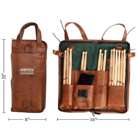 Keep your drumsticks organised and secure with this genuine leather drum stick bag! With room for up to 12 pairs of sticks, extra pockets for accessories, and a detachable shoulder strap, you'll be ready to rock on the go! #DrummingEssentials #WerKens #LeatherLove 🥁✨ Percussion Mallets, Drumstick Bag, Drum Stick Bag, Ear Phones, Egg Shakers, Drummer Gifts, Drum Sticks, Brass Hooks, Drum Accessories