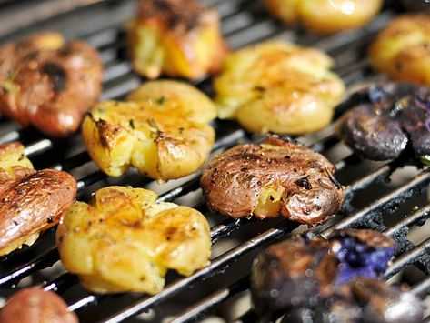 Grilled Smashed Potatoes Recipe | The crackling of the skin was a great contrast to the creamy innards, with the rosemary adding a nice fragrance and flavor. The best was when a nice piece of charred potato skin was mixed in, giving a hint of grill that made these such a nice use of the remaining heat that may have otherwise gone unused.	  #memorialdayweekend #memorialdayrecipes #longweekend #seriouseats #recipes Perfect Potatoes, Smashed Potatoes Recipe, Grill Food, Grilled Food, Bbq Sides, Grilled Potatoes, Smashed Potatoes, Camping Recipes, How To Cook Potatoes