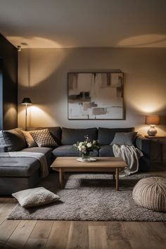 Dark Great Couch Living Room, Cozy Apartment Aesthetic Living Room Dark, Dark Academia Apartment Aesthetic Living Room, Living Room With Charcoal Sofa, Dark Couch Light Room, Styling A Dark Grey Couch, Apartment Black Decor, First Home Living Room Ideas, Cozy Living Room With Grey Couch