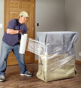 Wrapping a sofa, couch, or love seat with a blanket using plastic wrap will protect this piece of furniture when shipping or moving Moving House Tips, Moving Hacks Packing, Moving Blankets, Moving Checklist, Stretch Film, Furniture Movers, Moving Packing, Packing To Move, Moving Home