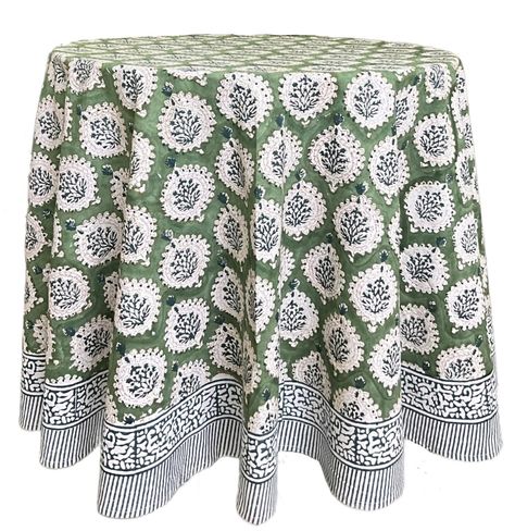 PRICES MAY VARY. MATERIAL - 100% COTTON : Our 'Kari Green' tablecloth is made of 100% power loom fabric which gives the fabric a strong, tighter & smooth weave. The fabric is superior grade with neatly finished stitched hems. SIZE - 72 Inches Round Tablecloth QUALITY CRAFTSMANSHIP : Our Kari Green table cloth floral design is inspired by the French Provencal Art. It is handmade using wooden blocks & printed by hand. Each table cloth is a a work of art and serves as a dining kitchen table cover a 90 Inch Round Tablecloth, Floral Table Cloth, Green Tablescape, Colorful Table Setting, Fall Tablecloth, Home Table Decor, Green Tablecloth, Floral Table, Green Table