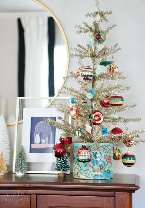 A eclectic and color Christmas home with lots of globally inspired DIYs and decorating ideas!   #modernglobaldecor #globaleclecticdecor #diybloggershouse #eclecticglobal #diyhomedecoronabudget #christmasdecor #christmasdecorationideas Small Faux Christmas Trees, Modern Vintage Christmas Decor, Maximalist Christmas Decor, Tabletop Christmas Tree Ideas, Colourful Christmas Decorations, Anthropology Christmas, Eclectic Christmas Decor, Colorful Christmas Decor, Vintage Inspired Christmas Tree