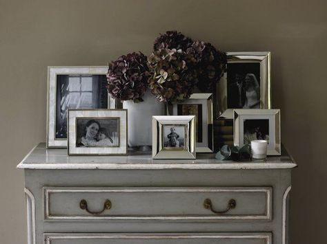 Photo Frames On Console Table, Picture Frames Console Table, Dresser Decor Picture Frames, Picture Frame Arrangements On Table, Tabletop Photo Display Ideas, Console Table Picture Frames, Picture Frame Layout, Picture Frame Arrangements, Displaying Family Pictures