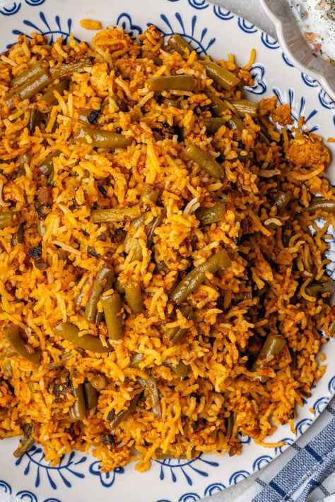 Lubia Polo is a Persian Green Bean Rice, with fluffy rice and layers of a rich tomato sauce filled with green beans and is absolutely delicious! Bean And Rice, Bean Rice, Persian Recipes, Persian Green, Fluffy Rice, Persian Cuisine, Persian Food, Prep Recipes, Winter Recipes