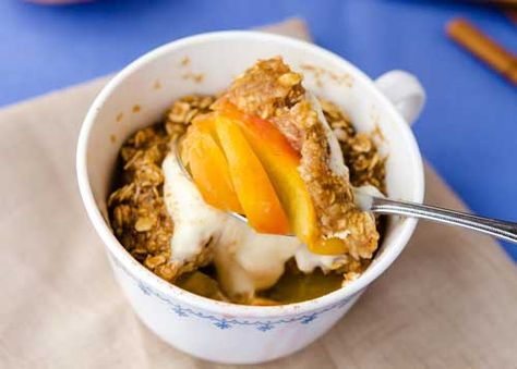 After the success of the Mug Cake in Everyday Happy Herbivore I wondered if I could make a pie or cobbler in a mug in my microwave. Still working on the pie, but this cobbler rocks! Peach Cobbler In A Mug, Peach Mug Cake, Cup Deserts, Cobbler In A Mug, Microwave Foods, Healthy Peach Cobbler, Cup Desserts, Vegan Peach Cobbler, Cake Microwave