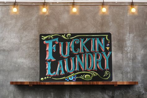 This beautifully crafted hand-painted metal sign is the perfect addition to any laundry room. With a vintage-inspired design, this sign adds a touch of charm to your home decor. Made from high-quality materials, this sign is built to last and withstand the test of time. The hand-painted lettering adds a personal touch that makes it the perfect gift for any mom. - Hand-painted design - High-quality materials - Vintage-inspired style - Perfect gift for mom Hang this sign in your laundry room to add a touch of vintage-inspired charm to your home decor. The sign comes ready to hang with pre-drilled holes and can be easily mounted on any wall. We take pride in the quality of our products and are confident in their durability and longevity. If for any reason you are not satisfied with your purch Basement Laundry Room Makeover, Retro Laundry Room, Vintage Laundry Sign, Laundry Wall Art, Wall Decor Retro, Laundry Room Art, Laundry Room Sign, Basement Laundry Room, Room Wall Colors