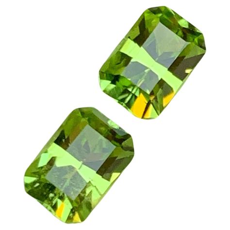 GEMSTONE TYPE: Natural Peridot PIECE(S): 2 WEIGHT: 1.95 Carats SHAPE: Emerald SIZE (MM): 0.95 Ct: 6.61 x 4.59 x 3.77 1.00 Ct: 6.65 x 4.67 x 3.77 COLOR: Lime Green CLARITY: Approximately Eye Clean TREATMENT: None ORIGIN: Pakistan CERTIFICATE: On demand (if you require a certificate, kindly request it before proceeding with the payment) A stunning pair of natural Peridot gemstones from the famed Kohistan region of Pakistan, totaling 1.95 carats. These exquisite gems are expertly cut into a classic Emerald Cut Earrings, Jewelry Pakistani, Light Mint Green, Cut Earrings, Emerald Cut Rings, Peridot Stone, Bluish Green, Peridot Gemstone, Tourmaline Gemstone