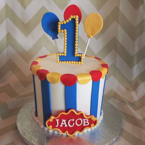 Circus Smash Cake | Milk & Honey Cakery Circus Carnival Cake, Circus Themed Cake, Carnival Birthday Party Cake, Clown Cake Ideas, Circus Cake Ideas, Circus Theme Cake Smash, Carnival Cake Smash, Carnival Cake Ideas, Carnival Theme Smash Cake