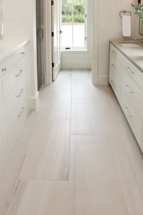 Big White Tile Floor, White Tile In Kitchen Floor, Light Color Tile Flooring, Tiled Kitchen Floor Next To Hardwood, Big Bathroom Floor Tile, Light Slate Tile Floor, Types Of Tile Flooring, Tile House Flooring, Large Bathroom Tiles Floor