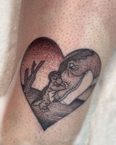 Samm Taylor☠️ サム・テイラー on Instagram: "This scene makes my heart smile.🥹 Anyone else a fan of The Land Before Time?🤍 #LandBeforeTime #BlackWork #NorthMountainTattoo #SammTatts" Land Before Time Dinosaurs Tattoo, Mom And Son Dinosaur Tattoo, Ducky Land Before Time Tattoo, Tree Star Tattoo Land Before Time, Little Foot Tattoos Land Before Time, Baby Dinosaur Tattoo, Land Before Time Tattoo, Little Foot Tattoos, Velociraptor Tattoo