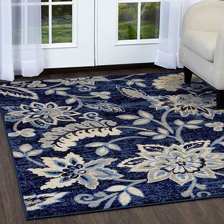 Transform any room in your home with the Tremont area rug by Home Dynamix. This luxurious, Wilton woven area rug, features a beautiful floral pattern in subtle shades of ivory and navy, with a sense of traditional designs and a touch of modern style. This soft and durable indoor rug has a delicate appeal, making it the ideal addition that compliments a variety of home settings, no matter your style. Thanks to the Décor friendly shades and timeless charm, it will blend in seamlessly with your alr White Dining Room Decor, Dining Room Blue, Dining Room Colors, White Dining Room, Rugs Floor, Navy Blue Area Rug, Rug Stain, Blue Area Rug, Rectangular Rugs