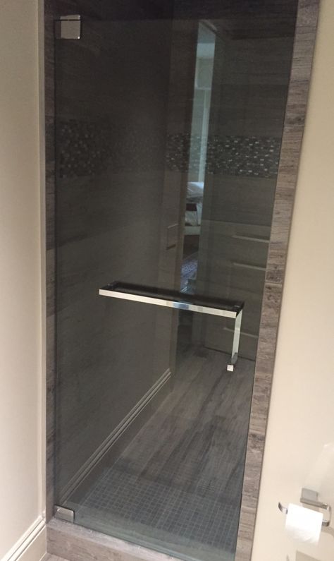 Shower Door with Towel Bar pull combo- Brilliant! -chrome square  The Glass Shoppe Bathroom Finishes, Shower Door Towel Bar, Bathroom Shower Doors, Framed Shower Door, Shower Door Handles, Glass Shower Doors Frameless, Frameless Sliding Shower Doors, Shower Door Hardware, Glass Shower Enclosures