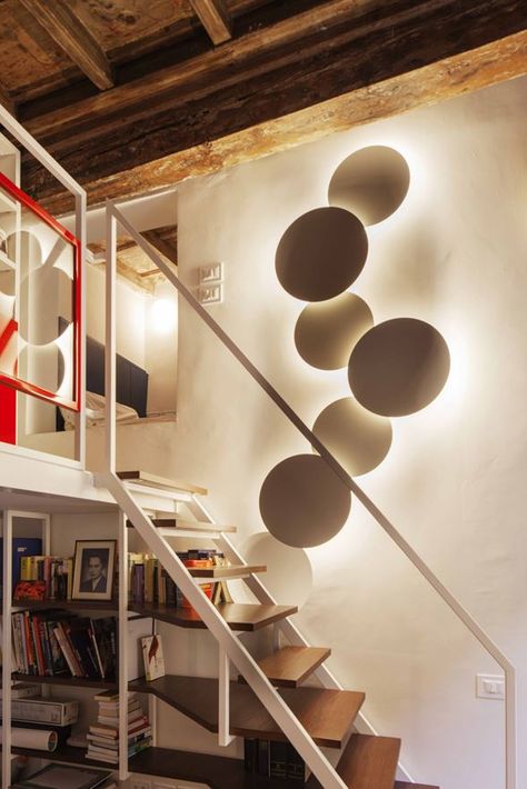 Puck Wall Art wall lamp designed by Jordi Vilardell at an apartment In Via Santa Marta, Milan, Italy, by Ortelli Architteti. http://www.vibia.com/en/puck-wall-art-wall-lights/?utm_source=social&utm_medium=pinterest&utm_campaign=puck_wall_appartment_in_Milan_prj&utm_content=pint_out utm_term= Stairwell Wall Ideas, Luminaria Diy, Stairwell Wall, Stairwell Lighting, Modern Outdoor Wall Lighting, Wall Lamp Design, Wall Art Lighting, Sconces Bedroom, Ceiling Lights Living Room