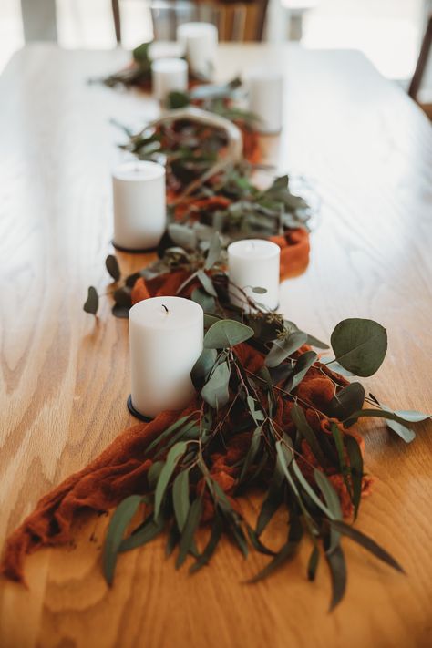 Farmhouse tables for a Wyoming wedding reception with DIY rust colored runners, eucalyptus, candles and found antlers. Bulk wedding flowers from Whirly Girl Flowers in Sheridan, WY Diy Simple Centerpieces, Easy Diy Centerpieces, Simple Centerpieces Diy, Rusting Wedding, Fall Wedding Tables, Mountain Top Wedding, Wedding Themes Fall, Simple Centerpieces, Table Runners Wedding