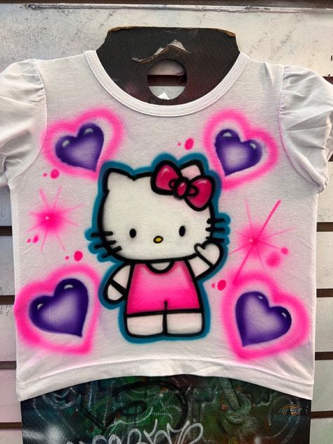 Hello Kitty Spray Paint Shirt, Hello Kitty Airbrush Shirt, Spray Paint Shirt, Cheer Box, Airbrush Ideas, Airbrush Shirts, Diy Hello Kitty, Hello Kitty T Shirt, Y2k Baddie