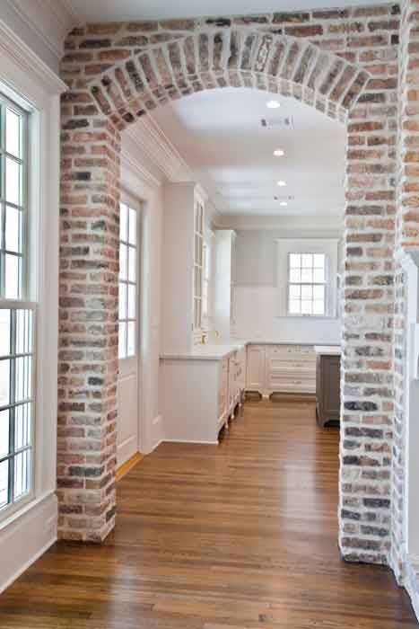 Beautiful brick entryway to a stunning white kitchen. Love it!!! Painting Fireplace, Brick Arches, German Smear, Brick Bathroom, Brick Farmhouse, Brick Archway, Cedar Hill Farmhouse, Brick Arch, Brick Walls