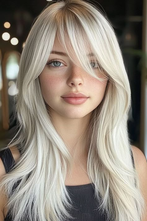 Icy Platinum Layers with Side-Swept Bangs, Trendy Long Straight Haircut Side Swept Bangs For Fine Hair, Sweeping Side Bangs, Side Parting Fringe, Sweeping Side Fringe, Mid Length Hair With Side Swept Bangs, Side Bangs Blonde Hair, Bangstyle Hair Long Side Part, Side Swept Bangs Straight Hair, Long Hair With Bangs Sideswept