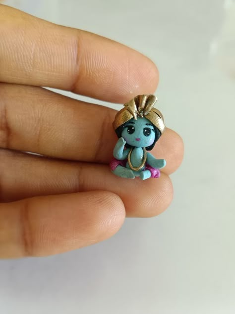 Clay Krishna Diy, Mini Clay Charms, Krishna Keychain, Krishna Clay Art, Mini Clay Crafts, Clay Art Ideas Easy, Clay Krishna, Small Clay Ideas Easy, Clay Miniatures Diy