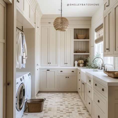 I love everything about this laundry room 😍 Check out more design inspo from Shelley Bates on the blog. Windows In Laundry Room, Dishwasher In Laundry Room, Concrete Countertops Laundry Room, Laundry Room Baskets Storage, Laundry Room With Lots Of Cabinets, Built In Laundry Room Cabinets, Traditional Farmhouse Laundry Room, Modern Classic Laundry Room, Classic Laundry Room Design