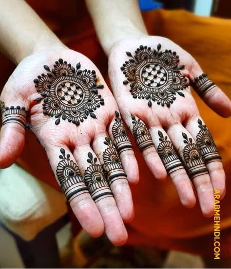 50 Gol Tikki Mehndi Design (Henna Design) - April 2020 Front Hand Tikki Design, Child Mehandi Design, Om Mehndi Designs, Tikki Mehndi Design Front Hand, Child Mehndi Design, Simple Tikki Mehndi Design, Om Tattoos, Gol Tikki Mehndi Design, Tikki Mehndi Design