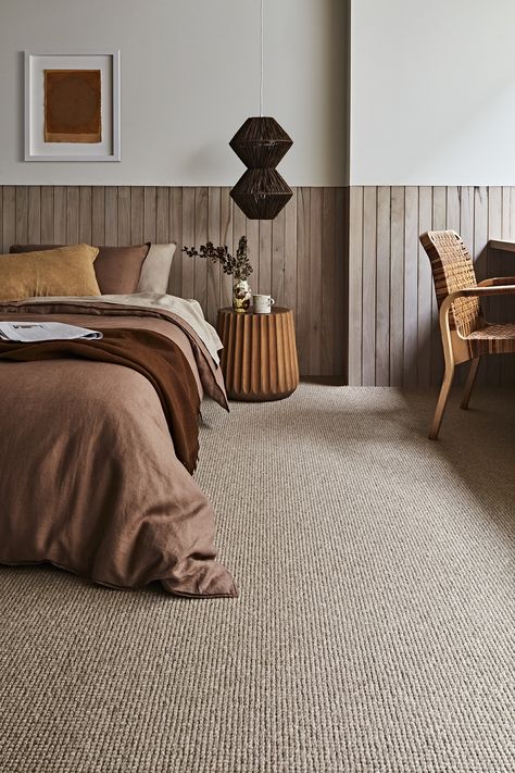 This chunky wool carpet is sure to add texture to any space. The straight stitch gives a grid like appearance, giving it a modern and refined appearance. Earthy Carpet Bedroom, How To Style A Carpeted Bedroom, Woven Carpet Bedroom, Modern House Carpet, Loop Carpet Living Room, Apartment Bedroom Carpet, Master Bedrooms Carpets, Bedroom Decor Carpet Floor, Light Brown Carpet Bedroom