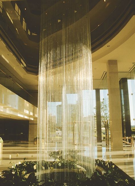 Hotel Water Feature, Waterfall Inside House, Lobby Water Feature, Inside Waterfall, Office Waterfall, Interior Waterfall, Beyonce Cowgirl, School Foyer, Museum Lobby