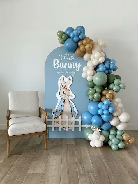 Peter rabbit baby shower. Baby shower balloons. A little bunny is on the way inspo A Little Bunny Is On The Way Baby Shower Decorations, Baby Boy Shower Ideas April, March Baby Shower Ideas Themes Boys, Baby Animal Shower Theme, April Baby Boy Shower Ideas, Somebunny Is On The Way, Easter Baby Shower Ideas Boy, A Little Bunny Is On The Way Decorations, Baby Shower Themes For Boys Spring