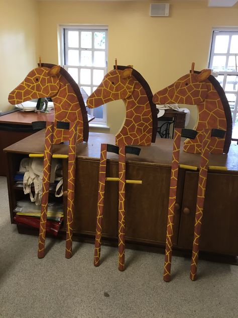 Lion King Junior, giraffe heads and legs. Lion King Junior Set, Lion King Giraffe Costume, Lion King Parade Float Ideas, Lion King Play Costumes, Lion King Play Props, Lion King Costume Ideas, Lion King Set Design, Lion King Musical Costumes, Lion King Props