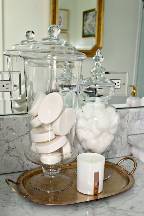 Such a simple idea for a bathroom. Fill a apothecary jar with white bars of soap and cotton balls. So fresh and clean! Rangement Makeup, Bathroom Jars, Guest Bathroom Decor, Simple Bathroom Decor, Blue Ceilings, Spa Like Bathroom, Bathroom Decor Ideas Colors, Bathroom Counter, Guest Bathrooms