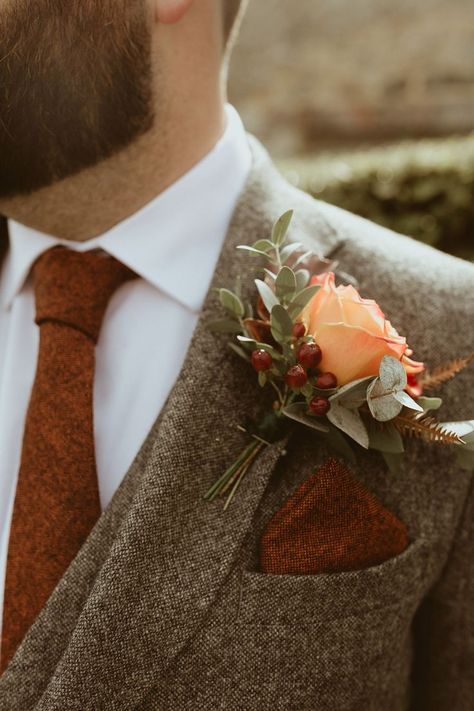 Brown three piece wedding suit with a burnt orange rust coloured tie and matching pocket square with an orange rose and berries as the buttonhole Brown Suit Wedding, Groom Buttonhole, Fall Groom, Rustic Groom, Rusting Wedding, Burnt Orange Weddings, Mens Wedding Attire, Groom Wedding Attire, Brown Suit