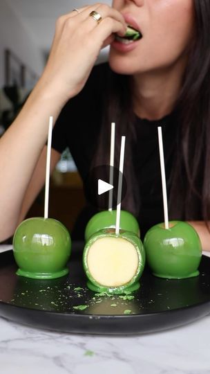 9.4K views · 552 reactions | Making my candy apples a little early this year cause I couldn’t miss the opportunity to use this song 😅🍏
love how vibrant they turned out! Do you guys love candy apples?
Recipe below
8-10 small apples
11/2 cups granulated sugar
1/2 cup water
1/2 cup light corn syrup
White gel food coloring
Lime green gel food coloring
In a large sauce pan with boiling water add apples. Toss them around with a wooden or silicon spatula for no more than 10 seconds.
Wipe each apple with a paper towel to remove excess wax.
Place cake pop stick into each apple and place them in the fridge to cool completely.
Prepare candy:
In a medium sized saucepan over medium to high heat place water, sugar and light corn syrup. Stir it completely. Use a candy thermometer or digital thermometer Green Candy Apples, Candy Apples Recipe, Colored Candy Apples, Apple Cake Pops, Candy Apple Recipe, Cake Pop Sticks, Pop Stick, Candy Thermometer, Green Candy