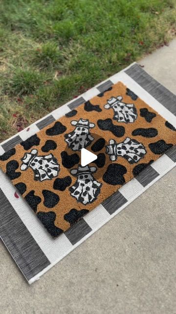 Freya Made Decor | Brittony Peterson | DIY Cow Print Ghost Doormat 🐮🤠👻   Boo-Haw! 🐄🎃  Available to order on my website in my “Halloween Doormats” collection! 🌙  #doormat... | Instagram Diy Ghost Doormat, Coir Doormat Diy, Halloween Rugs Diy, Fall Door Mats Diy, Diy Halloween Doormat, Diy Fall Doormat, Diy Painted Doormat, Halloween Doormat, Diy Doormat