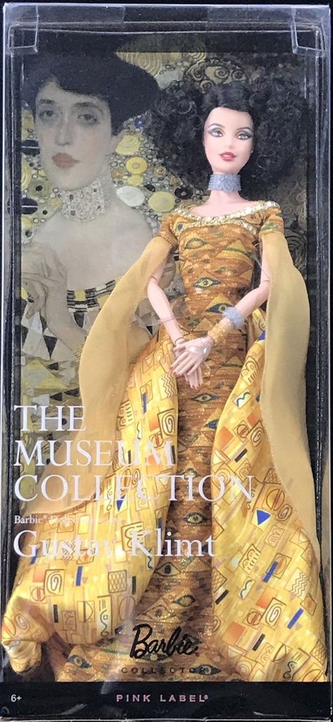 An amazing fusion of fashion and fine art, the Museum Collection dolls are a feast for the eyes! Gustav Klimt Barbie® doll echoes the artist's portrait, Adele Bloch-Bauer I, reflecting the painting's Byzantine mosaics and Egyptian motifs. She wears a halter gown with silvery trim, draped chiffon sleeves and bustle, as well as silvery choker and cuffs, and her curly parted hair and posable hands suggest the original. She is a magnificent muse both in and out of her exquisite packaging. V0443 ... Byzantine Mosaics, Adele Bloch Bauer, Egyptian Motifs, Byzantine Mosaic, Halter Gown, Museum Collection, Gustav Klimt, Adele, Barbie Doll