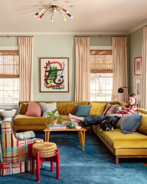 domino on Instagram: “Choosing a place to lounge around is part of the fun in @hannahacarpenter's Arkansas farmhouse, designed by @metacoleman_. Which seat would…” Meta Coleman Interiors, Hannah Carpenter House, Colorful Family Home, Wes Anderson Furniture, Max Humphrey Design, Wes Anderson Kitchen, Bright Living Room Colors, Bright Colorful Living Room Ideas, Wes Anderson Bedroom