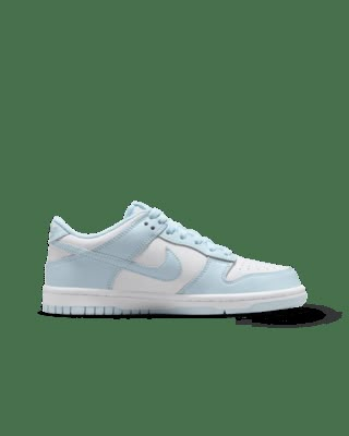 Designed for basketball but adopted by skaters, the Nike Dunk Low helped define sneaker culture. Now this mid-'80s icon is an easy score for your closet. With ankle padding and durable rubber traction, these are a slam dunk whether you're learning to skate or getting ready for school. Shown: White/Glacier Blue Style: FB9109-105 Nike Jordan Low Blue, Nike Dunks Light Blue, Preppy Nike Dunks, Light Blue Dunks, Preppy Nike Shoes, Kids Nike Dunks, Nike Blue Shoes, Light Blue Nike Shoes