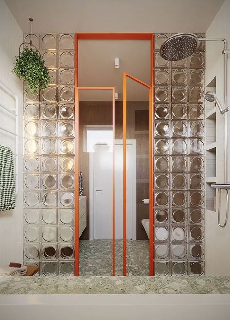 Discover this stunning bathroom designed by Framuga Studio in Poland | Featuring Alpha clear glass blocks and sleek aluminum doors with clear glass, this space creatively separates the wet and dry zones. The design balances warm wood tones, greenery, and beige hues with bold geometric shapes, incorporating squares, sage, walnut, and a striking orange frame | #bathroomdesign #boldinteriordesign #geometricstyle #glasspartition #modernbathroom #glassblock #glassbrick Modern Art Deco Bathroom, Best Bathroom Paint Colors, Bold Bathroom, Bathroom Paint, Deco Bathroom, Glass Brick, Bathroom Paint Colors, Glass Blocks, Contemporary Home Decor