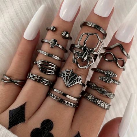 Gun Metal Halloween Ring Set Features All 15 Rings Pictured Includes Spider, Web, Skull, Stars, Snake, Infinity Symbol, Skeleton Hand Perfect For Halloween Or For Those Who Celebrate Halloween Year-Round! Rings Cute Aesthetic, Many Rings On Hand, Silver And Black Rings, Hand Full Of Rings, Emo Rings, Halloween Rings, Emo Jewelry, Punk Rings, 15 Rings