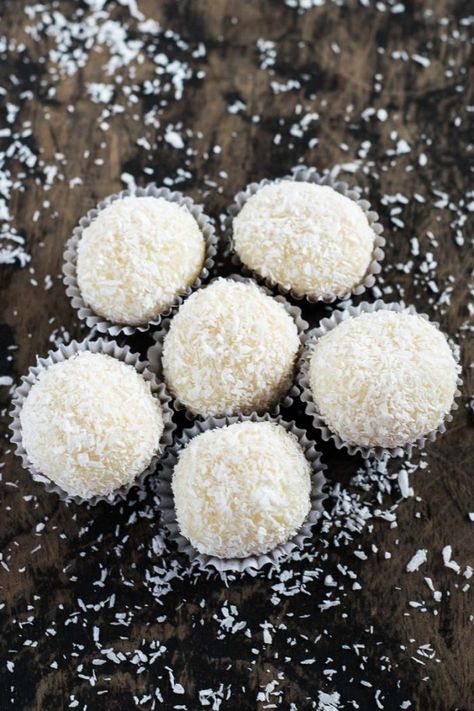 Brazilian Sweets: Beijinho | Travel Cook Telll Brazilian Recipes Dessert, Fudge Balls, Brazilian Sweets, Brazilian Desserts, Coconut Truffles, Sweet Condensed Milk, Maple Candy, Desiccated Coconut, Candy Truffles