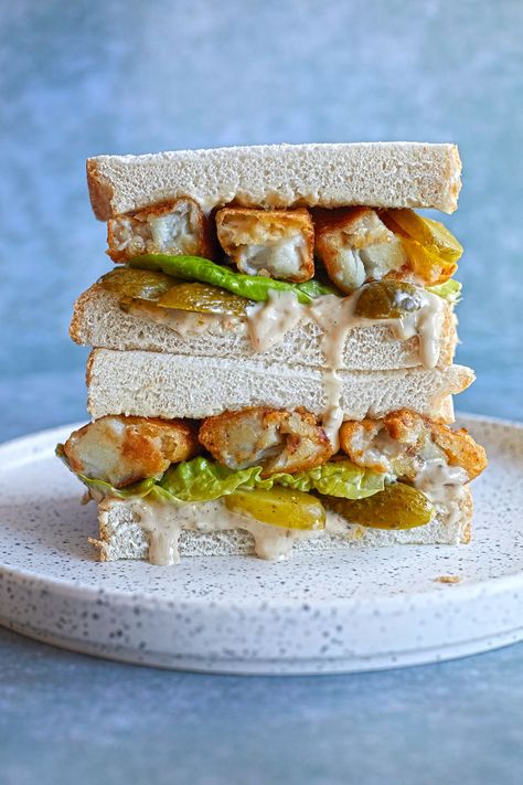 Homemade Fish Fingers Make The Ultimate Sandwich FillingDelish UK Fish Finger Sandwich, Tea Dinner Party, Mashed Potato Balls Recipe, Homemade Fish Fingers, Welsh Cakes Recipe, Beef Wellington Bites, Rhubarb Crumble Recipes, Finger Sandwich, Tartare Sauce