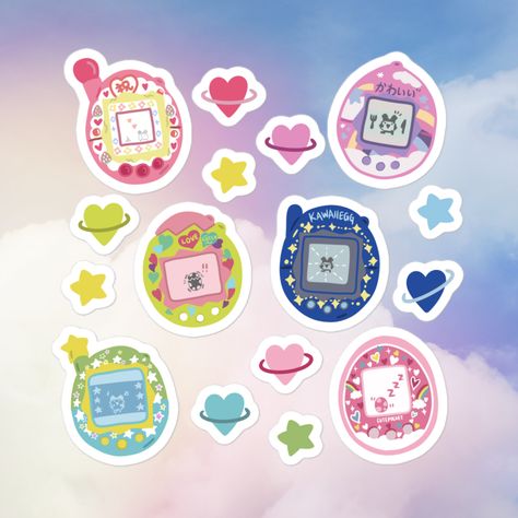 Did you have one of these in your childhood? Inspired by the cute Japanese toys Tamagotchi, we’ve drawn our own design of that cute digital pocket monster pet! These stickers contain six different designs and a variety of extra stars and hearts. This would be great for someone wanting a little 90s nostalgia or loves cute Japanese toys. #tamagotchi #tamagotchiuni #kawaiistickers #cutestickers #stickersheet #etsystickers #90schildhood #japantoy #japanesetoy Heart Character Design, Tamagotchi Cartoon, Tamagotchi Packaging, Tamagotchi Illustration, Tamagotchi Sticker, Ichigotchi Tamagotchi, Tamagotchi Sticker Sheet, Monster Stickers, Etsy Stickers