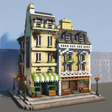 Blaze on Instagram: “Today’s post is a Paris street corner. . It features 4 buildings, a lamppost, awnings, chimneys, a flower stand, 2 posters, ivy, dormers…” Cottage Town Minecraft, Minecraft Modern Townhouse, Minecraft Fire Escape, Townhouse Minecraft Ideas, Minecraft French Building, Minecraft City House Ideas, Minecraft Houses City, Minecraft Urban Houses, Town Houses Minecraft